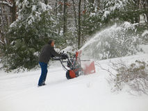 two-stage snowblower on steep path